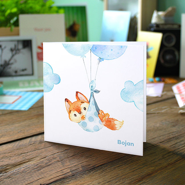 Gevouwen geboortekaartje van Studio Draak